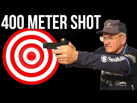 Impossible 400 meter shot with an M&P 9mm pistol by champion shooter, Jerry Miculek!