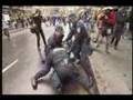 APEC Police gently tickle protester's ribs