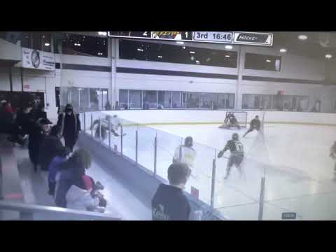 Matteo Andrew taking a hit to make a sweet pass out front for a goal.