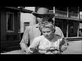 clips from the virginian (1929) and high noon (1952) mashed up to the high noon theme song 'do not forsake me oh my darling'.