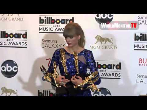 poses with her Awards backstage at Billboard Music Awards 2013