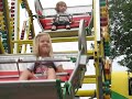 Chloe on the kiddie ferris wheel Chloe on the kiddie ferris wheel