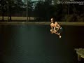 Man jumping off a dock into water at 500fps.