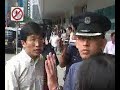 Riot police vs four silent protesters in Singapore Riot police vs four silent protesters in Singapore