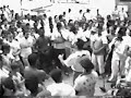 Roda gravada na Praça Sete de Setembro (Belo Horizonte), com os Grupos  Capoeira Gerais e Cordão de Ouro Eu Bahia A Senzala. Estavam presentes os Mestres Dunga, Mão Branca, Bocão e outros.Recorded at September 7th Square (Belo Horizonte, Brazil), featuring the groups Capoeira Gerais and Cordão de Ouro Eu Bahia A Senzala. Among others, Mestres Dunga, Mão Branca and Bocão were there.