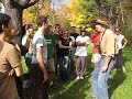 tom gavin likes to have his students bright-eyed and chipper during class... he decided that the best way to get them enthusiastic about moving firewood was to sing them a little song about waking up... here's to tom gavin. :)