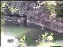 swinging off a rock