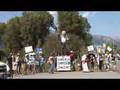 Cheney's neighbors topple him in protest
