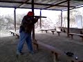 Guy Shooting Off An UZI With A Suppressor