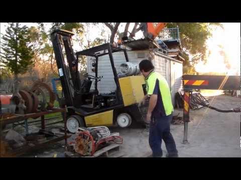 how to drain hydraulic fluid from forklift