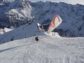 Skiing Down Schilthorn with a Parasailer Skiing Down Schilthorn with a Parasailer