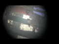 Telescope view - El Zonte surfers
