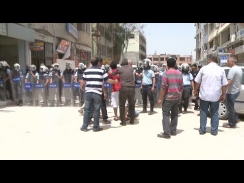 protest - CNN's Nic Robertson reports on clashes between police and protesters in Reyhanli, on the Turkey-Syria border. For more CNN videos, visit our site at http://w...