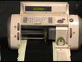 A borrowed Cricut Machine - 2 guys - and a folding chair