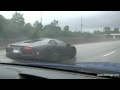 Reventon and Porsche CGT cruising in the rain