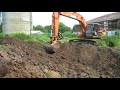 Case CX210 digging a fire pit