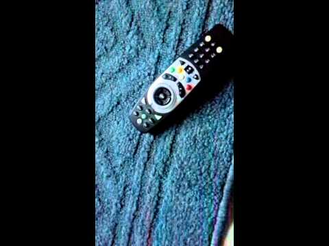 how to programme dstv remote control