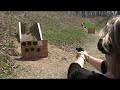 Nikka shooting a handgun for the first time.