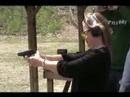 Nikka shooting a handgun for the first time.