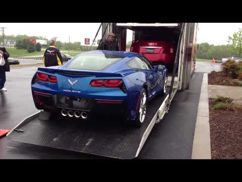 Corvette - At the end of the National Corvette Museum's 2013 Bash, the C7 Corvette Coupe and Convertible were moved outside and loaded into a transporter. Driving the C...