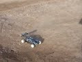 Mid-Engine Traxxas Rustler with Velineon System driving with buggie tires at River Track Mid-Engine Traxxas Rustler with Velineon System driving with buggie tires at River Track