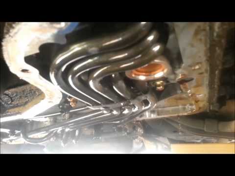 how to drain transmission fluid ford taurus