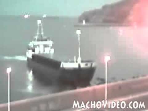 ship runs aground - Cargo Ship hits the shore.