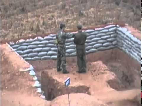 جندي صيني يلقي قنبلة يدوية بالخطأ