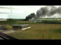 Double decker bus on fire and exploding