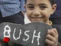 Scores of Shoes Thrown at Bush Caricature