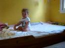 Mimi Playing on Bed