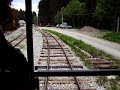 Entering Train-Station Oravska Lesna Tanecnik. Now the eastern terminus of the narrow gauge museum railroads HLUZ (Vychylovka) and OLZ (Oravska Lesna). In former times part of the railway-system from Lokca to Cadca. Train: Draisine V760.