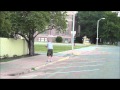 Osage City - Dave Gillow lights a M80 downtown.