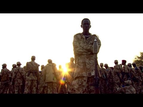 South sudan - Dramatic footage captured by the BBC's Alastair Leithead & cameraman Jack Garland who were with government troops advancing to the front line just outside Bo...