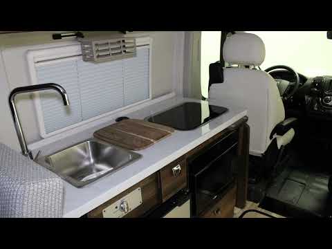 Used 2021 Granite Crystal Metallic Clearcoat Ram High Roof image 1