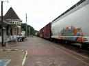 NS freight with UP power & a high & wide load in Tuscaloosa