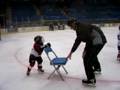 videos de Drew using a chair to help him balance on the ice.