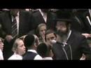 from the chanuka menorah lighting of munkach grand rabbi at the main synagogue in brooklyn. this sample contains the fifth stanza of maoz tzur as sung by the munkach yeshiva choir. 3rd night chanuka 5766 (2006). see the other video for the full movie. contact synagogue officers to buy the cd. the cd shows almost as clear as a dvd.