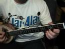 OUSAK - Tzoura - Dm Armoniko Minore taximi 9-2007OUSAK improvises on his new tzoura. Check out my website www.mpouzouki.comThis 8 string tzoura is basically a half size bouzouki. Visit my site: www.mpouzouki.comThe tzoura made by George Stasinopoulos www.bouzoukimaker.com