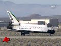 endeavour and its seven astronauts back on earth after a 16-day home makeover trip to the international space station.  the shuttle's landing was diverted to calif. by stormy weather at the primary landing strip in florida. (nov. 30)