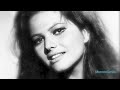 for my friend doug, who's birthday it is today... happy birthday doug! as a little present i thought i do a tribute to your favourite actress, and one of my favourite actresses, the outrageously beautiful and eternal screen goddess that is claudia cardinale. words cannot describe this actress, it is only when you see her face that you cannot comprehend anything more beautiful. aside from that she is one hell of an actress, who is still working strong today as she was back in the 1950's/ 60's prime. clips are from circus world, girl with a suitcase, eight and a half, the professionals, the leopard, the pink panther and once upon a time in the west. the music is 'an ending' by brian eno, for me it is a transcendental piece, fitting the cc's extroardinary beauty. i hope you like this doug, and everyone else who views it.