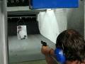 videos de Marc fires a hand pistol