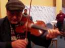 violinist aurel cioban plays with some of the edinets lautarii brass musicians as part of the other europeans project field trip to edinets, republic of moldova, nov. 23, 2008. musical director alan bern brought a group of jewish music researchers and klezmer musicians to meet with moldovan lautarii through the help of marin and diana bunea (violinist and ethnomusicologist, repectively.) the lautar tradition of northern moldova shares deep roots with klezmer music, and the local lautar even refer to themselves as 
