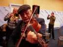 violinist aurel cioban plays with some of the edinets lautarii brass musicians as part of the other europeans project field trip to edinets, republic of moldova, nov. 23, 2008. musical director alan bern brought a group of jewish music researchers and klezmer musicians to meet with moldovan lautarii through the help of marin and diana bunea (violinist and ethnomusicologist, repectively.) the lautar tradition of northern moldova shares deep roots with klezmer music, and the local lautar even refer to themselves as 