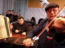 violinist aurel cioban plays with some of the edinets lautarii brass musicians as part of the other europeans project field trip to edinets, republic of moldova, nov. 23, 2008. musical director alan bern brought a group of jewish music researchers and klezmer musicians to meet with moldovan lautarii through the help of marin and diana bunea (violinist and ethnomusicologist, repectively.) the lautar tradition of northern moldova shares deep roots with klezmer music, and the local lautar even refer to themselves as 