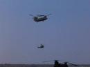Chinook Slinloading a Huey