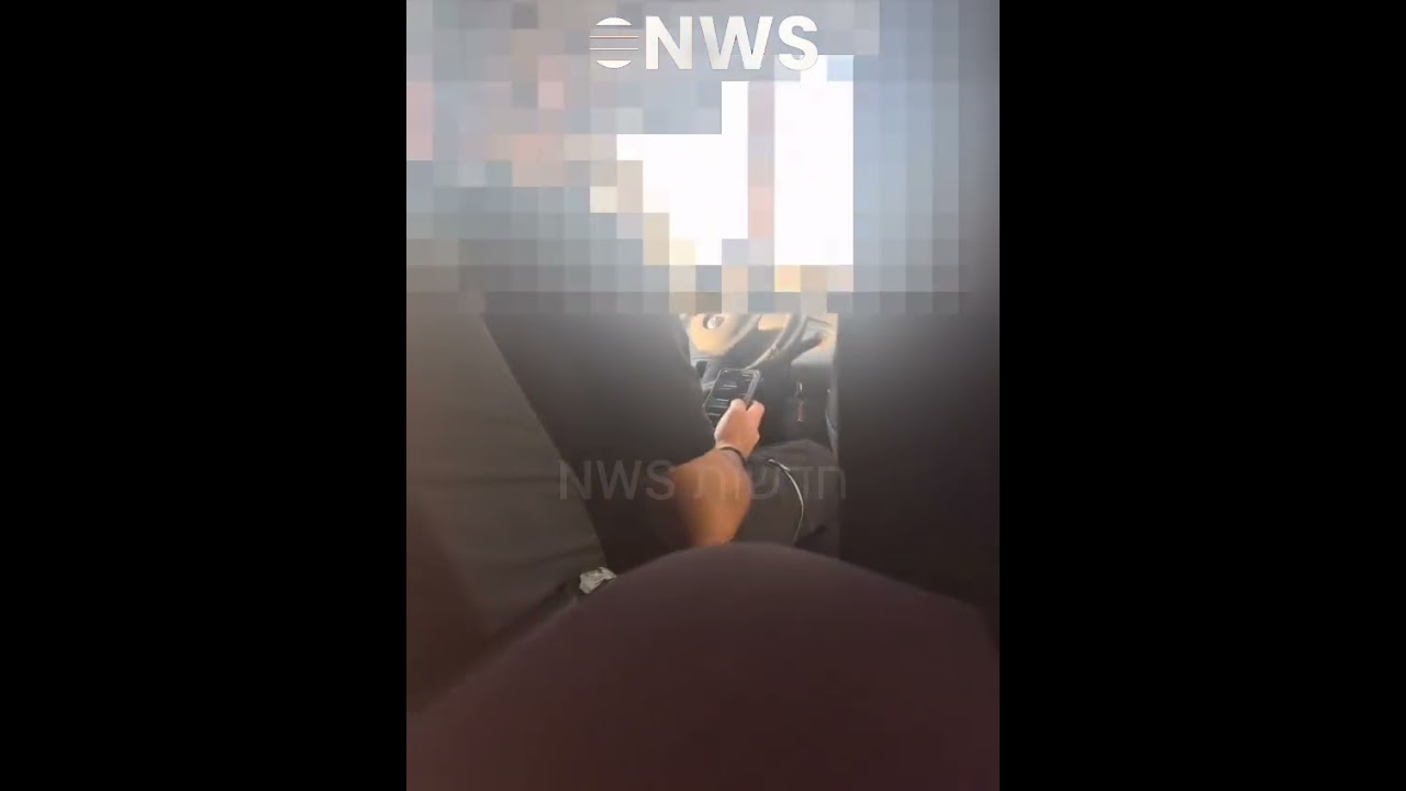 תיעוד נהג הסעות ילדי החינוך המיוחד מטעם עיריית קריית ביאליק נוהג עם טלפון נייד בידו