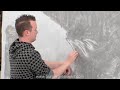 Phil Hansen paints the Mona Greasa with burger grease.