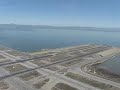Helo - mid-field transition over SFO - landing 747 and Mt Diablo