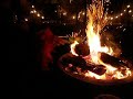 Boy Flips Burning Log with Bottle Boy Flips Burning Log with Bottle